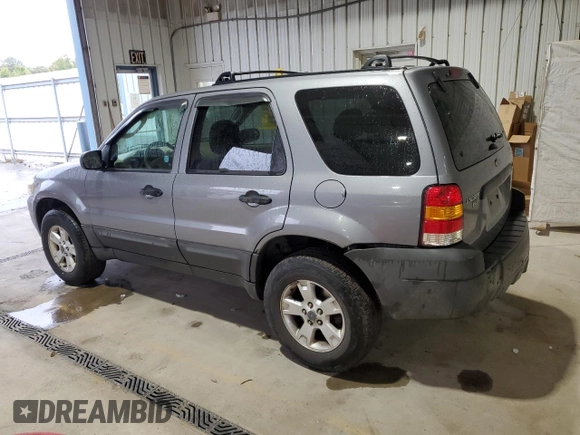 2007 Ford Escape XLT with VIN 1FMYU93107KA67692, listed as a Copart auction lot 72799184 with 230,668 mi miles and Salvage Title. Bid and sale history available at carsss.com. Image 2.