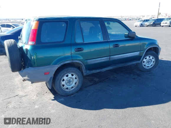 1999 Honda CR-V LX with VIN JHLRD1847XC031475, listed as a IAAI auction lot 41606369 with 254,445 mi miles. Bid and sale history available at carsss.com. Image 4.