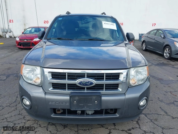 2010 Ford Escape XLT with VIN 1FMCU0D76AKA33885, listed as a IAAI auction lot 41837102 with 140,193 mi miles. Bid and sale history available at carsss.com. Image 6.