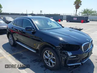 2020 BMW X4 xDrive30i with VIN 5UX2V1C06L9B62406, listed as a IAAI auction lot 40178700 with 48,947 mi miles. Bid and sale history available at carsss.com. Image 1.