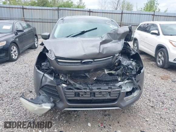 2013 Ford Escape SE with VIN 1FMCU0GX3DUC84979, listed as a IAAI auction lot 42067695 with 162,447 mi miles and . Bid and sale history available at DreamBid. Image 12.
