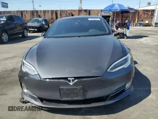 2019 Tesla Model S 75D with VIN 5YJSA1E2XKF305595, listed as a Copart auction lot 51838965 with Not provided miles and Salvage title. Bid and sale history available at DreamBid. Image 5.