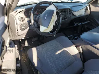 2003 Ford F-150 XL with VIN 1FTRX07W03KB17955, listed as a Copart auction lot 83061424 with 164,529 mi miles and Salvage Title. Bid and sale history available at carsss.com. Image 8.