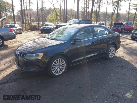 2012 Volkswagen Jetta Sedan SEL w/Sunroof with VIN 3VWLX7AJ2CM409673, listed as a IAAI auction lot 41860309 with 186,661 mi miles. Bid and sale history available at carsss.com. Image 2.