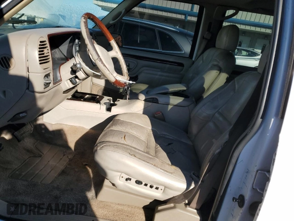 1999 Cadillac Escalade z VIN 1GYEK13R3XR406970, wystawiony jako Copart lot #87623365 z przebiegiem 189 339 mil mil oraz Szkoda całkowita • Salvage title. Historia ofert i sprzedaży dostępna na DreamBid. Obrazek 7.