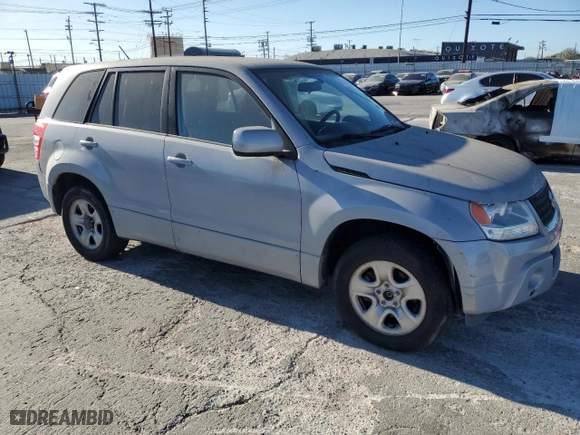 2010 Suzuki Grand Vitara Premium with VIN JS3TE0D29A4100863, listed as a Copart auction lot 87547975 with 113,398 mi miles and Salvage Title. Bid and sale history available at carsss.com. Image 4.