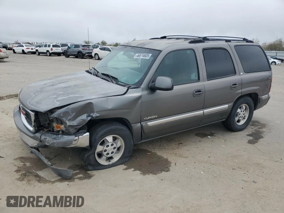 2002 GMC Yukon SLE z VIN 1GKEC13V52J192656, wystawiony jako Copart lot #46674605 z przebiegiem 258 336 mil mil oraz Szkoda całkowita • Salvage title. Historia ofert i sprzedaży dostępna na DreamBid. Obrazek 1.