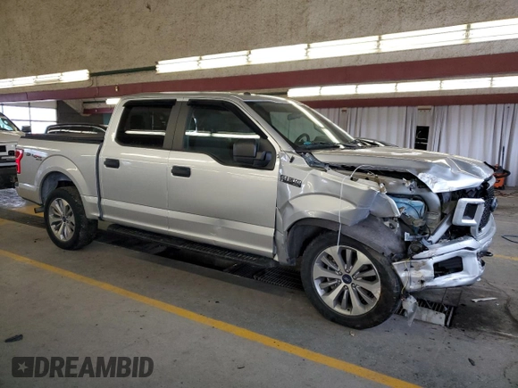 2018 Ford F-150 XL with VIN 1FTEW1EP8JFD26238, listed as a Copart auction lot 41449795 with 53,369 mi miles and Salvage Title. Bid and sale history available at carsss.com. Image 4.