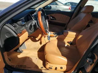 2006 Maserati Quattroporte z VIN ZAMCE39A960023356, wystawiony jako Copart lot #76954384 z przebiegiem 76 185 mil mil oraz Szkody całkowita. Historia ofert i sprzedaży dostępna na DreamBid. Obrazek 7.