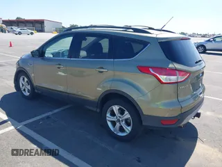 2013 Ford Escape SE with VIN 1FMCU0G99DUC05901, listed as a IAAI auction lot 42194672 with 121,435 mi miles and . Bid and sale history available at DreamBid. Image 3.