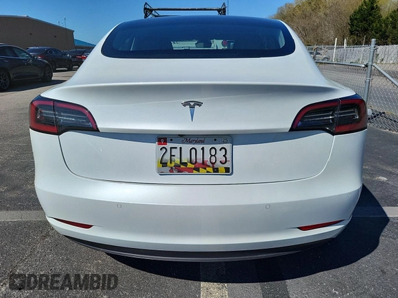 2020 Tesla Model 3 Long Range with VIN 5YJ3E1EBXLF795059, listed as a IAAI auction lot 42133884 with 58,841 mi miles and . Bid and sale history available at DreamBid. Image 1.