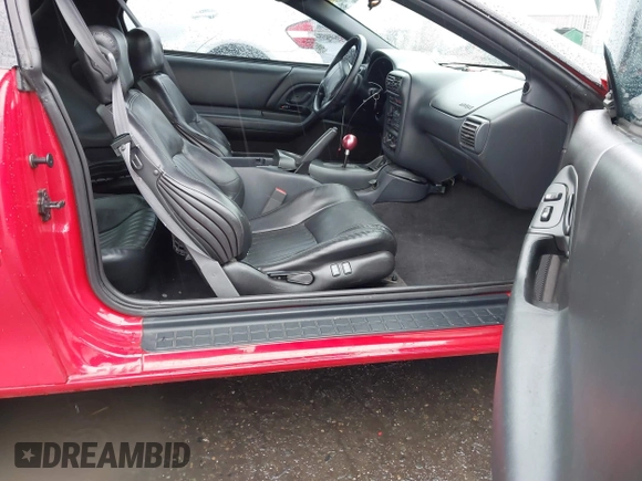1999 Chevrolet Camaro Z28 z VIN 2G1FP22G2X2112215, wystawiony jako IAAI lot #41459474 z przebiegiem 106 832 mil mil oraz . Historia ofert i sprzedaży dostępna na DreamBid. Obrazek 5.