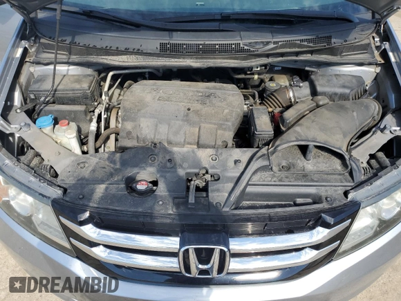 2016 Honda Odyssey EX-L with VIN 5FNRL5H65GB117587, listed as a Copart auction lot 50508535 with 105,001 mi miles and Salvage Title. Bid and sale history available at DreamBid. Image 12.