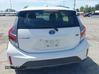 2018 Toyota Prius One with VIN JTDKDTB33J1613019, listed as a IAAI auction lot 42063768 with 59,143 mi miles and . Bid and sale history available at DreamBid. Image 16.