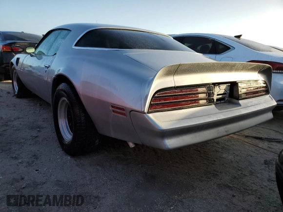 1977 Pontiac Firebird z VIN 2W87Z7N152633, wystawiony jako Copart lot #41438935 z przebiegiem 17 837 mil mil oraz Nie do naprawy • Non repairable. Historia ofert i sprzedaży dostępna na DreamBid. Obrazek 2.