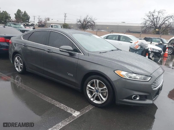 2015 Ford Fusion Energi Titanium with VIN 3FA6P0SU2FR173958, listed as a IAAI auction lot 41504220 with 170,235 mi miles. Bid and sale history available at carsss.com. Image 1.