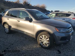 2013 Volkswagen Touareg Lux with VIN WVGEF9BPXDD002285, listed as a Copart auction lot 82248604 with 150,780 mi miles and Salvage Title. Bid and sale history available at DreamBid. Image 4.