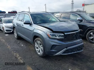 2021 Volkswagen Atlas SE z VIN 1V2WR2CA0MC585259, wystawiony jako IAAI lot #41525783 z przebiegiem 80 101 mil mil oraz . Historia ofert i sprzedaży dostępna na DreamBid. Obrazek 1.