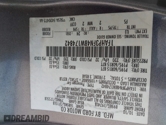 2011 Ford Focus SE with VIN 1FAHP3FN4BW174842, listed as a IAAI auction lot 42027681 with 58,616 mi miles. Bid and sale history available at carsss.com. Image 9.