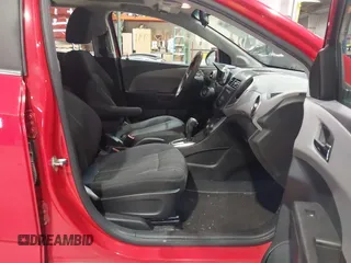 2014 Chevrolet Sonic LT with VIN 1G1JC6SB1E4125174, listed as a IAAI auction lot 41521991 with 125,490 mi miles. Bid and sale history available at carsss.com. Image 5.