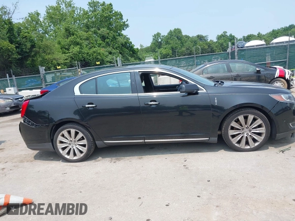 2013 Lincoln MKS EcoBoost with VIN 1LNHL9FT3DG602190, listed as a IAAI auction lot 42483472 with 63,238 mi miles and . Bid and sale history available at DreamBid. Image 13.