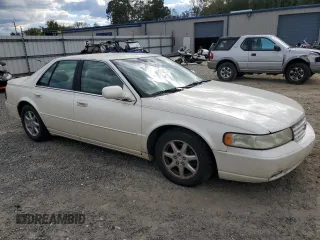 2002 Cadillac Seville Luxury SLS z VIN 1G6KS54Y42U263557, wystawiony jako Copart lot #76303424 z przebiegiem 164 707 mil mil oraz Szkoda całkowita • Salvage title. Historia ofert i sprzedaży dostępna na DreamBid. Obrazek 4.