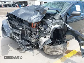 2018 Ford Fusion Hybrid SE with VIN 3FA6P0LU1JR116139, listed as a IAAI auction lot 41933594 with 83,000 mi miles. Bid and sale history available at carsss.com. Image 6.