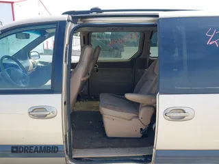 1999 Plymouth Voyager Grand SE z VIN 1P4GP44G0XB613853, wystawiony jako IAAI lot #42064199 z przebiegiem 175 050 mil mil oraz . Historia ofert i sprzedaży dostępna na DreamBid. Obrazek 8.