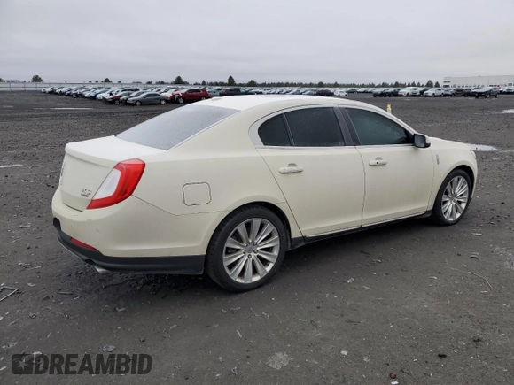 2014 Lincoln MKS EcoBoost с VIN 1LNHL9FT7EG601089, выставлен на аукционе Copart как лот 49483605 с пробегом 121 709 миль миль и Списание • Salvage title. История ставок и продаж доступна на DreamBid. Изображение 3.