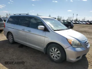 2010 Honda Odyssey EX-L with VIN 5FNRL3H60AB501157, listed as a Copart auction lot 54698995 with 277,974 mi miles and Salvage Title. Bid and sale history available at carsss.com. Image 4.