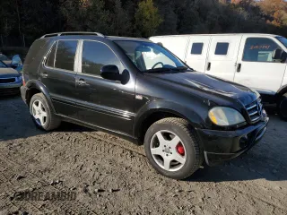 2000 Mercedes-Benz M-Class AMG with VIN 4JGAB74E4YA213337, listed as a Copart auction lot 78241244 with 159,530 mi miles and Salvage Title. Bid and sale history available at carsss.com. Image 4.