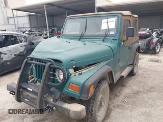 1997 Jeep Wrangler SE with VIN 1J4FY29P1VP408966, listed as a IAAI auction lot 41683640 with 106,910 mi miles. Bid and sale history available at carsss.com. Image 17.