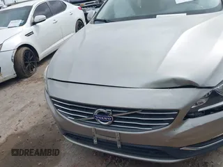 2016 Volvo S60 T5 Drive-E Premier with VIN YV126MFK0G2414153, listed as a IAAI auction lot 41931477 with 75,792 mi miles. Bid and sale history available at carsss.com. Image 12.