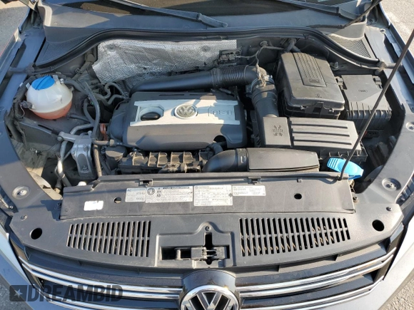 2013 Volkswagen Tiguan SE z VIN WVGAV7AX2DW023093, wystawiony jako Copart lot #64694405 z przebiegiem 137 460 mil mil oraz Szkoda całkowita • Salvage title. Historia ofert i sprzedaży dostępna na DreamBid. Obrazek 12.