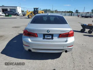2018 BMW 5 Series 530e with VIN WBAJA9C52JG623073, listed as a Copart auction lot 82718984 with 79,543 mi miles and Clean title. Bid and sale history available at DreamBid. Image 6.