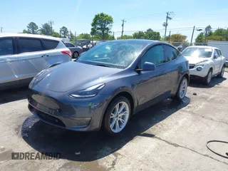 2023 Tesla Model Y Long Range with VIN 7SAYGDEE5PF882582, listed as a IAAI auction lot 42059015 with 10,567 mi miles and . Bid and sale history available at carsss.com. Image 19.