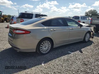 2015 Ford Fusion SE Hybrid z VIN 3FA6P0LU7FR102723, wystawiony jako Copart lot #62334345 z przebiegiem 136 341 mil mil oraz Nie do naprawy • Non repairable. Historia ofert i sprzedaży dostępna na DreamBid. Obrazek 3.