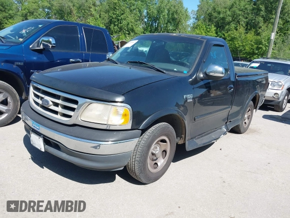 2000 Ford F-150 XL with VIN 1FTRF17L6YKA00872, listed as a IAAI auction lot 42195407 with 210,209 mi miles and . Bid and sale history available at DreamBid. Image 2.