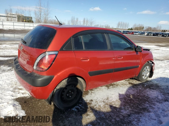 2009 Kia Rio LX with VIN KNADE243596567394, listed as a Copart auction lot 42240065 with 160,044 mi miles and Salvage Title. Bid and sale history available at carsss.com. Image 3.
