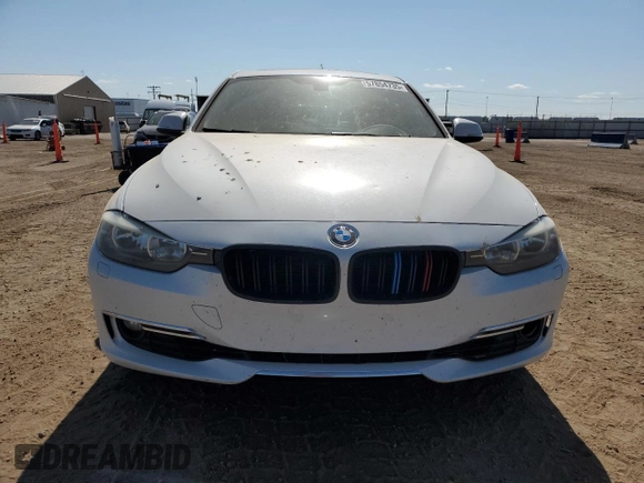 2013 BMW 3 Series 328i xDrive with VIN WBA3B3C51DF532714, listed as a Copart auction lot 57854735 with 140,650 mi miles and Salvage title. Bid and sale history available at DreamBid. Image 5.