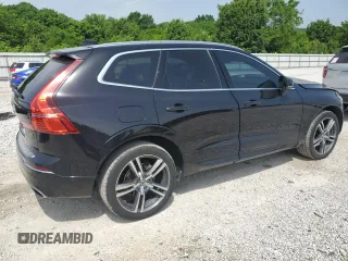 2018 Volvo XC60 Momentum with VIN LYV102RK6JB083622, listed as a Copart auction lot 56909505 with 89,197 mi miles and Salvage title. Bid and sale history available at DreamBid. Image 3.