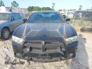 2012 Dodge Charger Police z VIN 2C3CDXAG3CH262847, wystawiony jako IAAI lot #42167010 z przebiegiem 123 274 mil mil oraz . Historia ofert i sprzedaży dostępna na DreamBid. Obrazek 6.