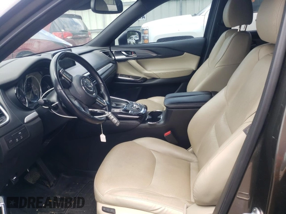 2018 Mazda CX-9 Grand Touring с VIN JM3TCADY9J0205299, выставлен на аукционе Copart как лот 60306095 с пробегом 113 766 миль миль и Списание • Salvage title. История ставок и продаж доступна на DreamBid. Изображение 7.