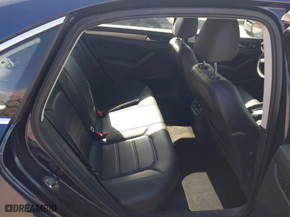 2014 Volkswagen Passat TDI SE w/Sunroof with VIN 1VWBN7A30EC055207, listed as a IAAI auction lot 41893637 with 133,074 mi miles. Bid and sale history available at carsss.com. Image 8.