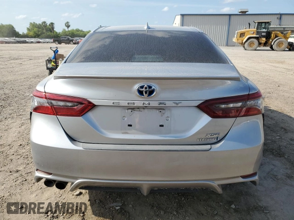 2022 Toyota Camry Hybrid XSE z VIN 4T1K31AK2NU571829, wystawiony jako Copart lot #52363675 z przebiegiem 52 918 mil mil oraz Szkoda całkowita • Salvage title. Historia ofert i sprzedaży dostępna na DreamBid. Obrazek 6.