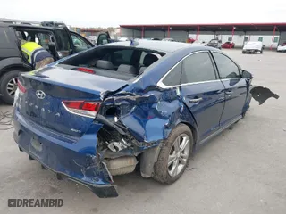 2019 Hyundai Sonata Sport with VIN 5NPE34AF0KH771734, listed as a IAAI auction lot 41277557 with 58,092 mi miles. Bid and sale history available at carsss.com. Image 4.