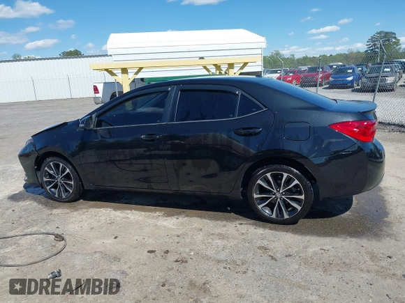 2019 Toyota Corolla L z VIN 5YFBURHE2KP897493, wystawiony jako IAAI lot #42052106 z przebiegiem 100 303 mil mil oraz . Historia ofert i sprzedaży dostępna na DreamBid. Obrazek 14.