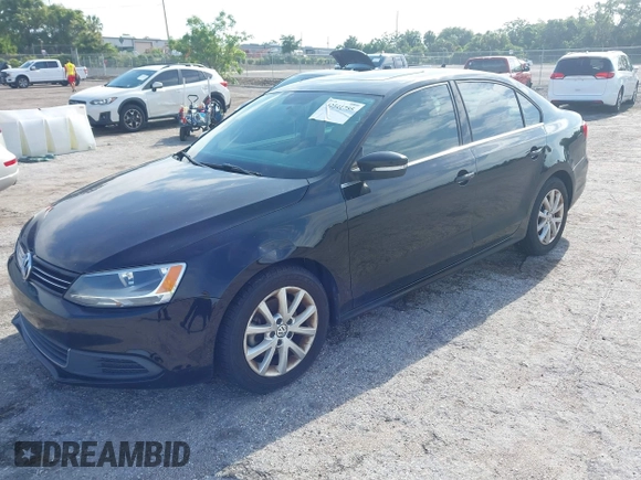 2014 Volkswagen Jetta SE with VIN 3VWD07AJ6EM413088, listed as a IAAI auction lot 42541755 with 163,278 mi miles and . Bid and sale history available at DreamBid. Image 2.