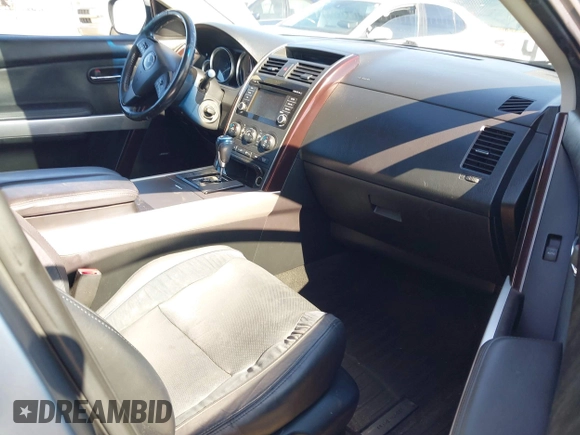 2014 Mazda CX-9 Grand Touring z VIN JM3TB3DV9E0437380, wystawiony jako IAAI lot #42298066 z przebiegiem 169 644 mil mil oraz . Historia ofert i sprzedaży dostępna na DreamBid. Obrazek 5.