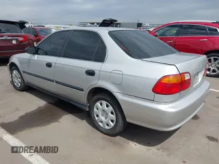 1999 Honda Civic LX with VIN JHMEJ6671XS003027, listed as a IAAI auction lot 41825146 with 197,764 mi miles and . Bid and sale history available at DreamBid. Image 3.